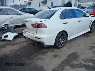 2014 Mitsubishi Lancer Evolution MR with VIN JA32W5FV5EU017592, listed as a IAAI auction lot 41158408 with 97,614 mi miles. Bid and sale history available at carsss.com. Image 4.