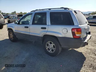 2004 Jeep Grand Cherokee Laredo with VIN 1J4GW48S54C103651, listed as a Copart auction lot 62972615 with 188,000 mi miles and Clean title. Bid and sale history available at DreamBid. Image 2.