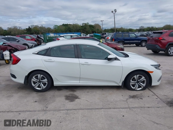 2020 Honda Civic LX with VIN 2HGFC2F69LH521681, listed as a IAAI auction lot 41664332 with 37,038 mi miles and . Bid and sale history available at DreamBid. Image 13.