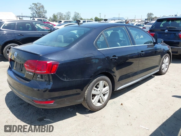 2013 Volkswagen Jetta Hybrid SE with VIN 3VW637AJ8DM299657, listed as a IAAI auction lot 42538101 with 128,822 mi miles and . Bid and sale history available at DreamBid. Image 4.