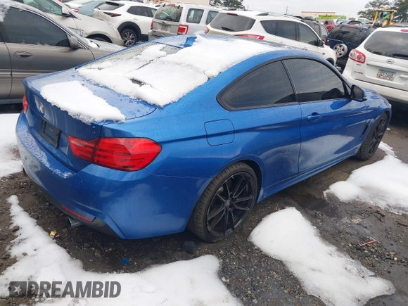 2017 BMW 4 Series 440i with VIN WBA4P1C50HK522098, listed as a IAAI auction lot 41282953 with 105,299 mi miles and . Bid and sale history available at carsss.com. Image 4.