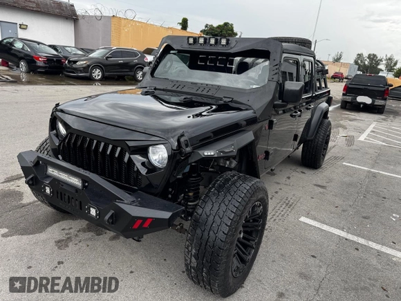 2024 Jeep Gladiator Sport S with VIN 1C6HJTAG2RL132886, listed as a Copart auction lot 63946735 with 6,111 mi miles and Clean title. Bid and sale history available at DreamBid. Image 2.