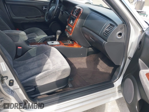 2003 Hyundai Sonata GLS with VIN KMHWF35H93A897855, listed as a IAAI auction lot 41527610 with 122,010 mi miles. Bid and sale history available at carsss.com. Image 5.