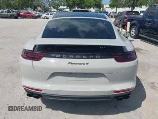 2018 Porsche Panamera 4 E-Hybrid z VIN WP0AE2A7XJL174378, wystawiony jako IAAI lot #42303125 z przebiegiem 35 636 mil mil oraz . Historia ofert i sprzedaży dostępna na DreamBid. Obrazek 16.