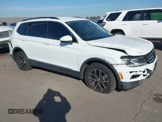 2021 Volkswagen Tiguan SE z VIN 3VV3B7AX6MM091355, wystawiony jako IAAI lot #41603670 z przebiegiem 81 234 mil mil oraz . Historia ofert i sprzedaży dostępna na DreamBid. Obrazek 1.