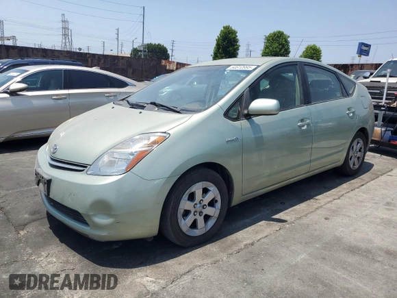 2008 Toyota Prius with VIN JTDKB20U483405080, listed as a Copart auction lot 64610995 with 127,437 mi miles and Salvage title. Bid and sale history available at DreamBid. Image 1.