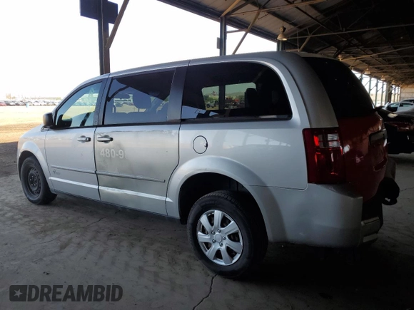 2009 Dodge Grand Caravan SE with VIN 1D8HN44E09B511597, listed as a Copart auction lot 61754875 with 410,045 mi miles and Clean title. Bid and sale history available at DreamBid. Image 2.