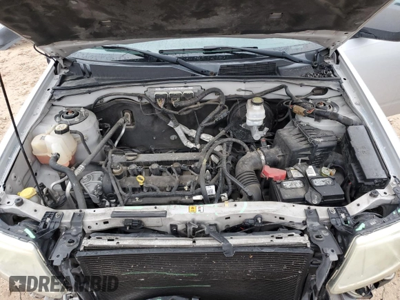 2011 Mazda Tribute Touring with VIN 4F2CY0C73BKM07056, listed as a Copart auction lot 85149404 with 138,265 mi miles and Salvage Title. Bid and sale history available at carsss.com. Image 12.