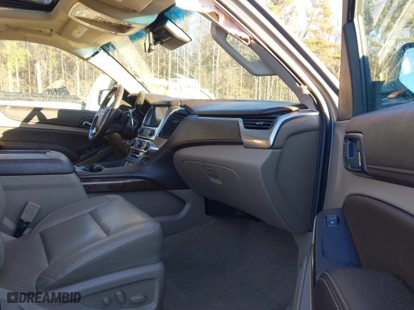 2019 Chevrolet Tahoe LT with VIN 1GNSCBKC8KR123828, listed as a IAAI auction lot 41256573 with 125,618 mi miles. Bid and sale history available at carsss.com. Image 5.