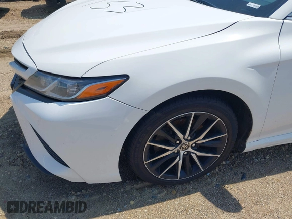 2018 Toyota Camry LE z VIN JTNB11HK2J3048094, wystawiony jako IAAI lot #42331953 z przebiegiem 239 000 mil mil oraz . Historia ofert i sprzedaży dostępna na DreamBid. Obrazek 6.