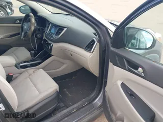 2016 Hyundai Tucson SE with VIN KM8J3CA43GU090127, listed as a IAAI auction lot 41488094 with 122,676 mi miles. Bid and sale history available at carsss.com. Image 5.