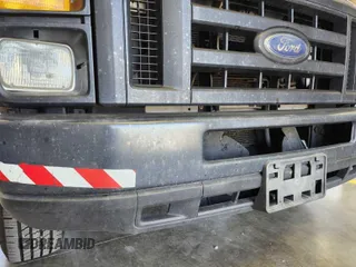 2009 Ford Econoline Cargo z VIN 1FTNE24L39DA13631, wystawiony jako IAAI lot #42563186 z przebiegiem 140 603 mil mil oraz . Historia ofert i sprzedaży dostępna na DreamBid. Obrazek 36.