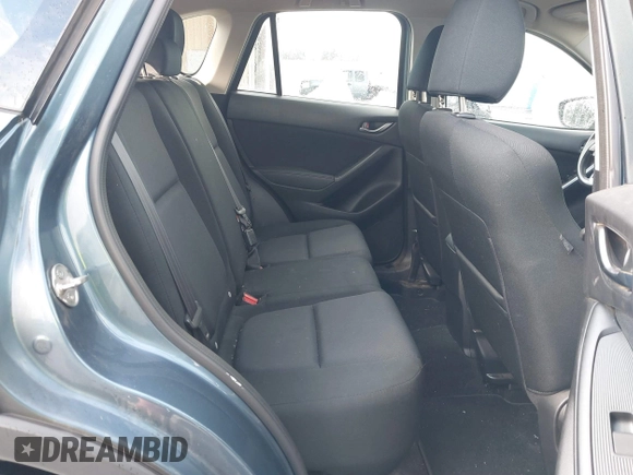 2015 Mazda CX-5 Sport with VIN JM3KE4BY0F0507727, listed as a IAAI auction lot 41249151 with 95,343 mi miles. Bid and sale history available at carsss.com. Image 8.