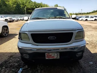 2003 Ford F-150 XLT with VIN 1FTRW08L23KD65857, listed as a Copart auction lot 71634004 with 321,505 mi miles and Clean Title. Bid and sale history available at carsss.com. Image 5.