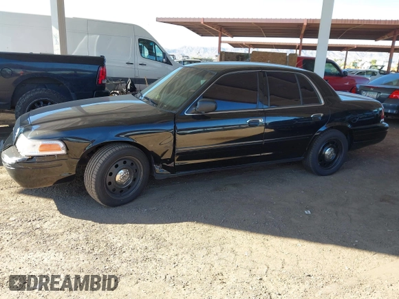 2007 Ford Police Interceptor with VIN 2FAFP71W27X115458, listed as a IAAI auction lot 42566334 with 213,435 mi miles and . Bid and sale history available at DreamBid. Image 17.
