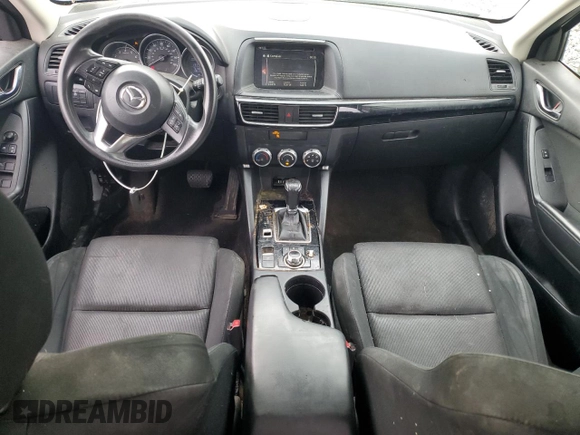 2016 Mazda CX-5 Sport с VIN JM3KE4BY4G0899953, выставлен на аукционе Copart как лот 57269035 с пробегом 196 158 миль миль и Списание • Salvage title. История ставок и продаж доступна на DreamBid. Изображение 8.