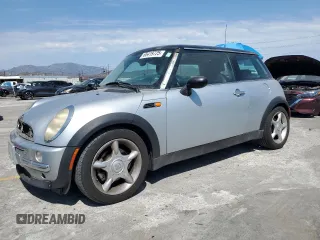 2003 MINI Hardtop with VIN WMWRC33453TE14909, listed as a Copart auction lot 65419725 with 111,960 mi miles and Salvage title. Bid and sale history available at DreamBid. Image 1.