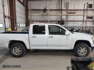2012 Chevrolet Colorado LT w/1LT with VIN 1GCHTCFEXC8128458, listed as a IAAI auction lot 41758826 with 267,202 mi miles. Bid and sale history available at carsss.com. Image 13.