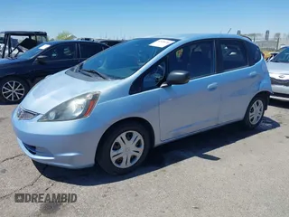 2009 Honda Fit z VIN JHMGE88259S037601, wystawiony jako IAAI lot #42428704 z przebiegiem 55 823 mil mil oraz . Historia ofert i sprzedaży dostępna na DreamBid. Obrazek 19.