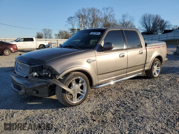 2002 Ford F-150 Harley Davidson with VIN 1FTRW07372KD29243, listed as a Copart auction lot 42972905 with 164,392 mi miles and Salvage Title. Bid and sale history available at carsss.com. Image 1.