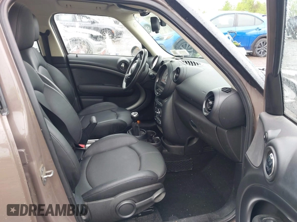2014 MINI Countryman S with VIN WMWZC5C54EWM17898, listed as a IAAI auction lot 42343469 with 112,773 mi miles and . Bid and sale history available at DreamBid. Image 5.