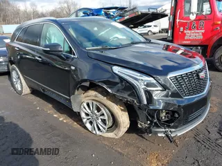 2020 Cadillac XT5 Premium Luxury AWD with VIN 1GYKNDRS2LZ183191, listed as a IAAI auction lot 41217033 with 87,307 mi miles. Bid and sale history available at carsss.com. Image 1.