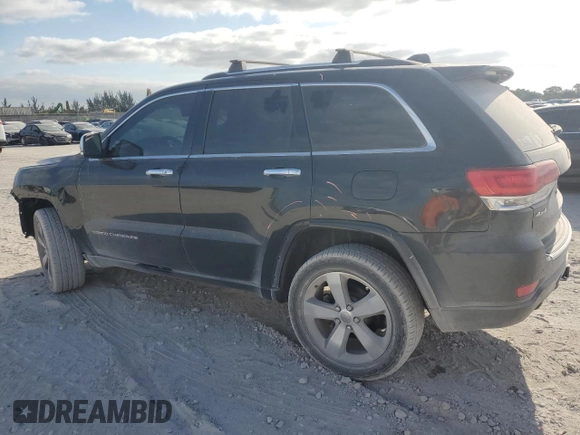 2015 Jeep Grand Cherokee Overland with VIN 1C4RJFCG6FC919637, listed as a Copart auction lot 52072925 with 111,552 mi miles and Salvage Title. Bid and sale history available at carsss.com. Image 2.