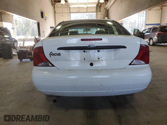 2003 Ford Focus LX with VIN 1FAFP33P43W201570, listed as a Copart auction lot 43130555 with 222,727 mi miles and Salvage Title. Bid and sale history available at carsss.com. Image 6.