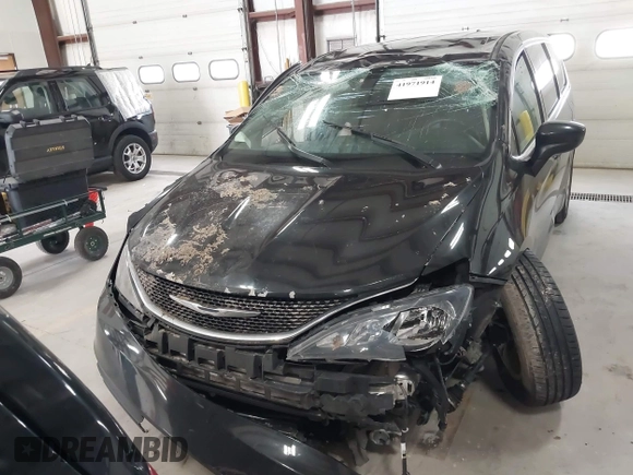 2017 Chrysler Pacifica Touring with VIN 2C4RC1DGXHR585294, listed as a IAAI auction lot 41971914 with 153,028 mi miles and . Bid and sale history available at DreamBid. Image 11.
