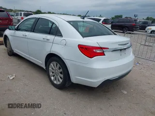 2013 Chrysler 200 Touring with VIN 1C3CCBBB6DN693975, listed as a IAAI auction lot 42137676 with 114,360 mi miles and . Bid and sale history available at DreamBid. Image 3.