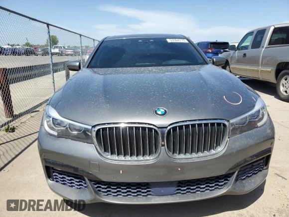 2017 BMW 7 Series 740i with VIN WBA7E2C55HG739108, listed as a Copart auction lot 53304715 with 114,510 mi miles and Salvage title. Bid and sale history available at DreamBid. Image 5.