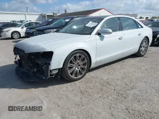 2015 Audi A8 L 4.0T with VIN WAU32AFD4FN002639, listed as a IAAI auction lot 41703951 with 103,722 mi miles. Bid and sale history available at carsss.com. Image 2.