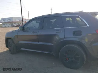 2015 Jeep Grand Cherokee SRT with VIN 1C4RJFDJ9FC842448, listed as a IAAI auction lot 41850385 with 178,439 mi miles. Bid and sale history available at carsss.com. Image 14.