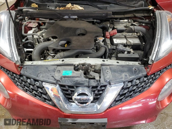 2015 Nissan Juke SL z VIN JN8AF5MV1FT559560, wystawiony jako Copart lot #50146625 z przebiegiem 62 824 mil mil oraz Szkoda całkowita • Salvage title. Historia ofert i sprzedaży dostępna na DreamBid. Obrazek 13.