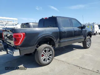 2021 Ford F-150 XL with VIN 1FTFW1E54MFD11453, listed as a Copart auction lot 50240015 with 8,645 mi miles and Salvage title. Bid and sale history available at DreamBid. Image 3.