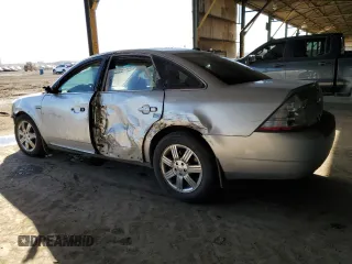 2009 Ford Taurus Limited with VIN 1FAHP25W99G123958, listed as a Copart auction lot 75100894 with 187,735 mi miles and Salvage Title. Bid and sale history available at carsss.com. Image 2.