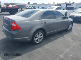 2012 Ford Fusion SE with VIN 3FAHP0HA6CR305816, listed as a IAAI auction lot 42041656 with 275,172 mi miles. Bid and sale history available at carsss.com. Image 4.