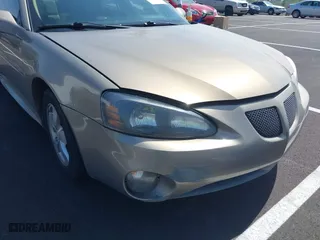 2007 Pontiac Grand Prix with VIN 2G2WP552971151953, listed as a IAAI auction lot 41996318 with 323,690 mi miles. Bid and sale history available at carsss.com. Image 6.