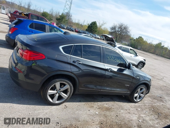 2017 BMW X4 xDrive28i with VIN 5UXXW3C36H0T79679, listed as a IAAI auction lot 42203662 with 137,863 mi miles and . Bid and sale history available at DreamBid. Image 13.