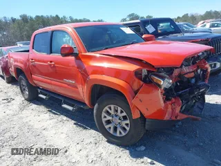 2018 Toyota Tacoma SR5 with VIN 5TFAZ5CN5JX066115, listed as a IAAI auction lot 41816133 with 70,283 mi miles and . Bid and sale history available at DreamBid. Image 1.