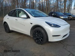 2023 Tesla Model Y Long Range with VIN 7SAYGAEE1PF967353, listed as a Copart auction lot 88700135 with 16,249 mi miles and Salvage Title. Bid and sale history available at DreamBid. Image 4.