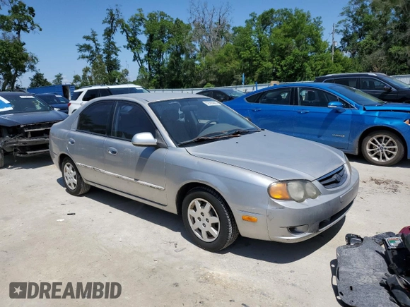 2004 Kia Spectra GS with VIN KNAFB161945141309, listed as a Copart auction lot 52395445 with 99,100 mi miles and Clean Title. Bid and sale history available at DreamBid. Image 4.