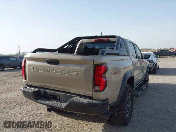 2024 Chevrolet Colorado 4WD ZR2 z VIN 1GCPTFEK4R1145701, wystawiony jako IAAI lot #42262513 z przebiegiem 8 666 mil mil oraz . Historia ofert i sprzedaży dostępna na DreamBid. Obrazek 4.