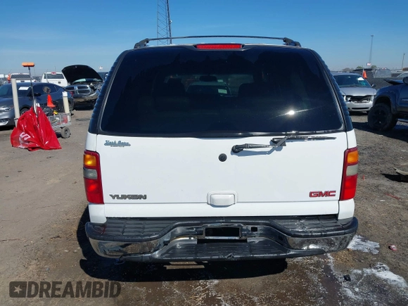2003 GMC Yukon SLT with VIN 1GKEC13Z13J197955, listed as a IAAI auction lot 41586841 with 208,752 mi miles. Bid and sale history available at carsss.com. Image 16.