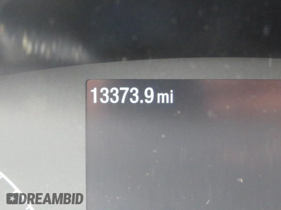 2023 Ford Transit Cargo with VIN 1FTYE1Y81PKB92726, listed as a Copart auction lot 87962485 with 13,373 mi miles and Salvage Title. Bid and sale history available at DreamBid. Image 8.