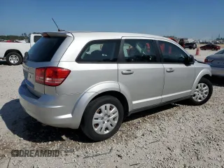 2013 Dodge Journey American Value with VIN 3C4PDCAB1DT715799, listed as a Copart auction lot 52404815 with 185,559 mi miles and Salvage Title. Bid and sale history available at DreamBid. Image 3.