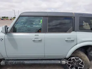 2023 Ford Bronco z VIN 1FMEE5BP9PLA97587, wystawiony jako IAAI lot #42168516 z przebiegiem 29 622 mil mil oraz . Historia ofert i sprzedaży dostępna na DreamBid. Obrazek 14.