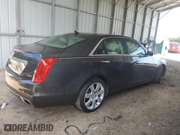 2014 Cadillac CTS Performance RWD with VIN 1G6AS5S37E0140091, listed as a Copart auction lot 60694094 with 130,587 mi miles and Salvage Title. Bid and sale history available at DreamBid. Image 3.