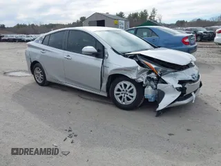 2016 Toyota Prius Two with VIN JTDKBRFUXG3023523, listed as a IAAI auction lot 41757143 with 124,144 mi miles. Bid and sale history available at carsss.com. Image 1.