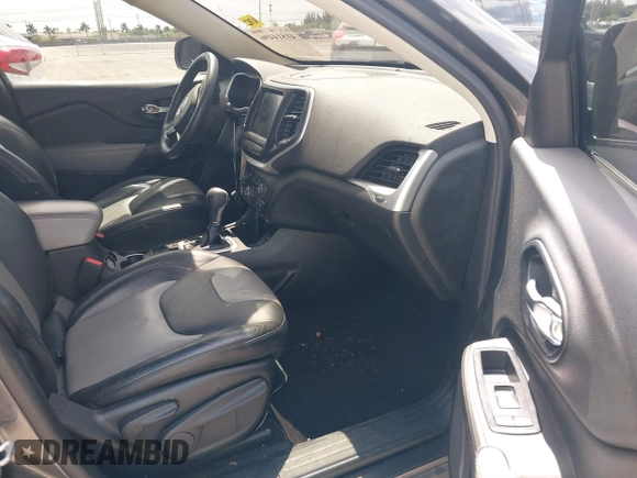 2014 Jeep Cherokee Limited with VIN 1C4PJLDBXEW183095, listed as a IAAI auction lot 41814496 with 89,589 mi miles and . Bid and sale history available at DreamBid. Image 5.